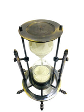 Brass hourglass with 5-minute timer and decorative compass